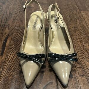 NEW PRICE!  
On trend slingbacks!  Bandolino patent leather.